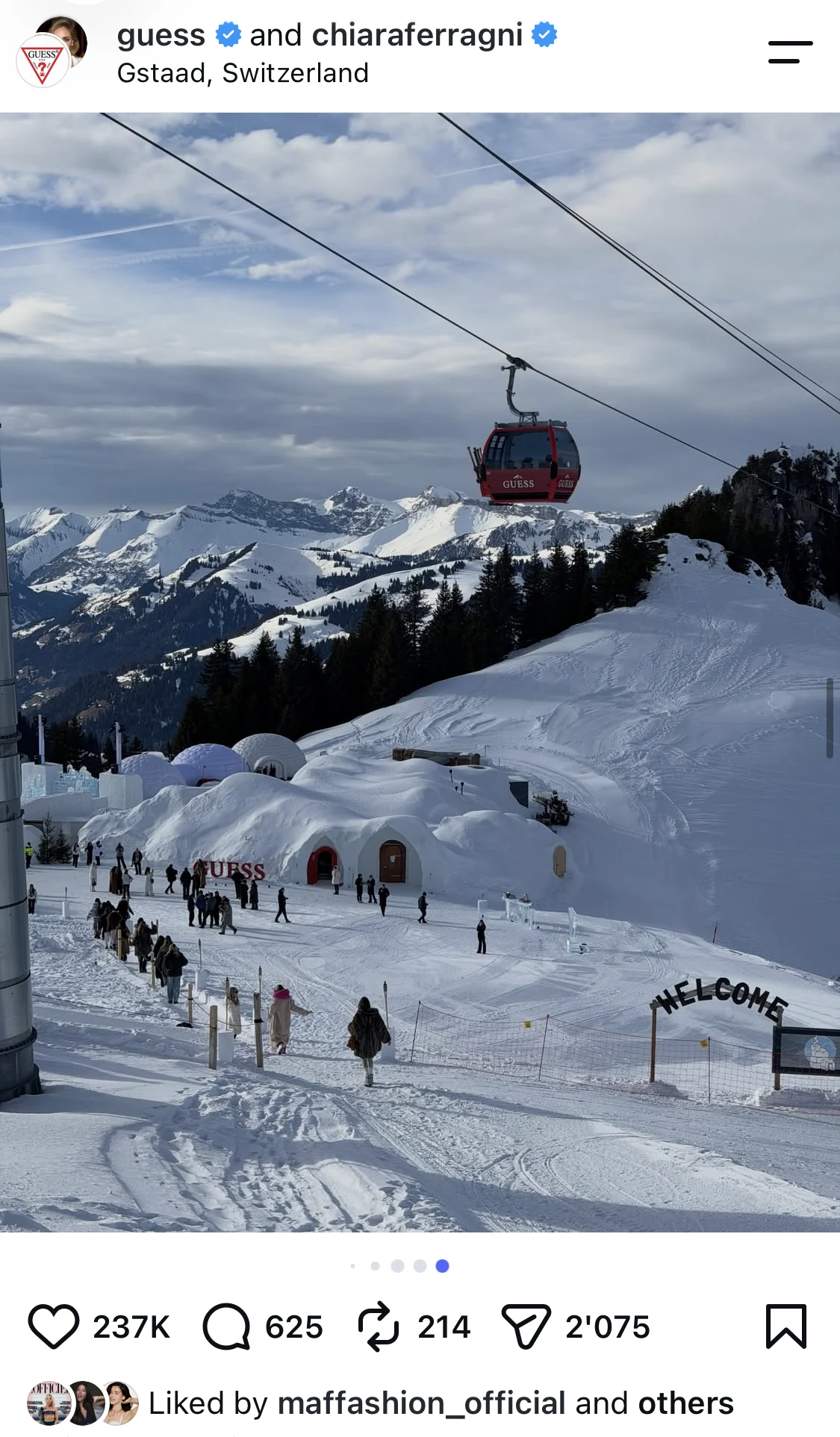 Snow-covered GUESS fashion show venue and branded cable car at Saanerslochgrat