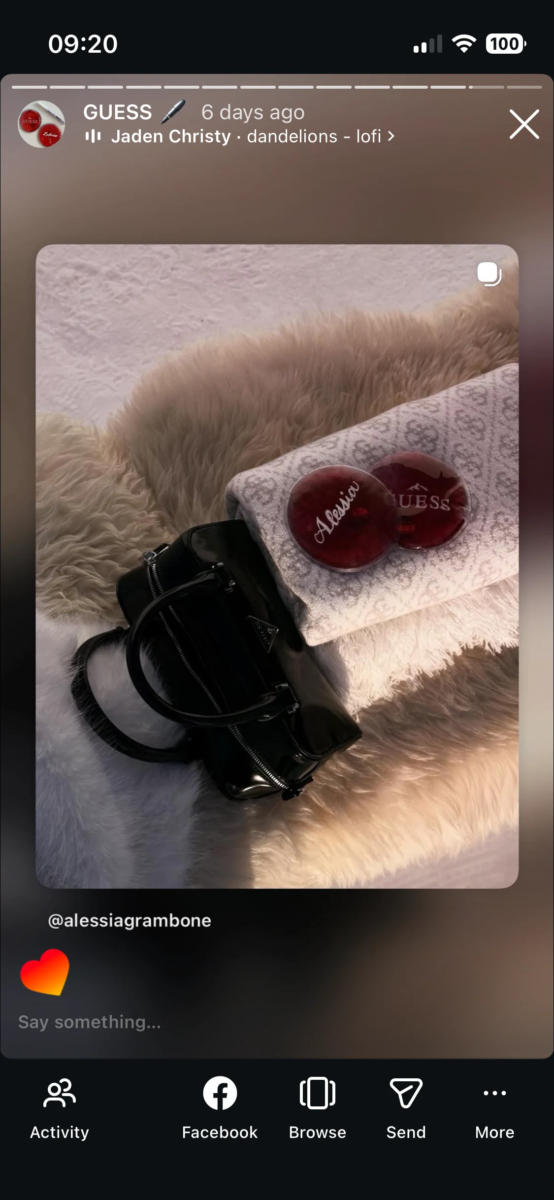 Instagram story showing an Alessia handwarmer beside a black handbag