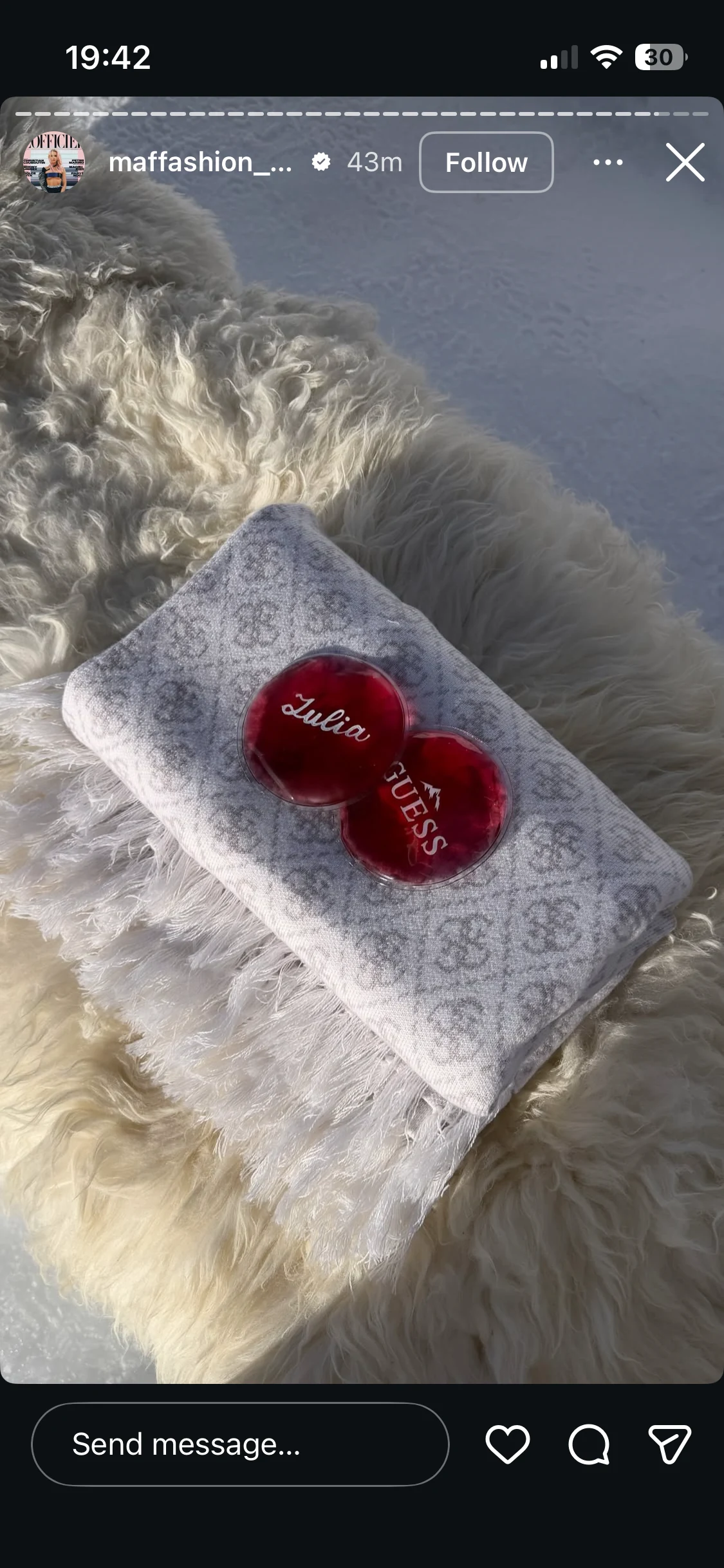 Instagram story showing GUESS handwarmers personalised for Julia