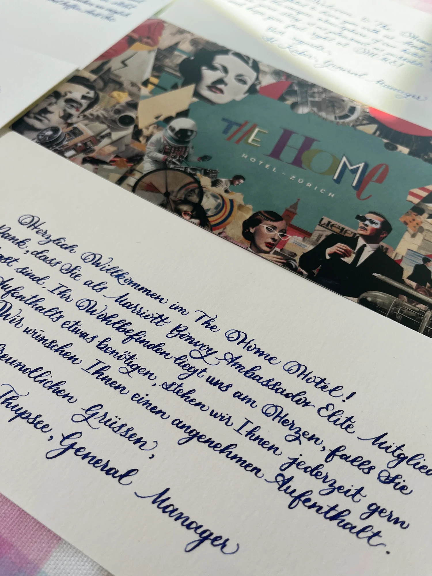 Close-up of the initial German welcome card in traditional calligraphy