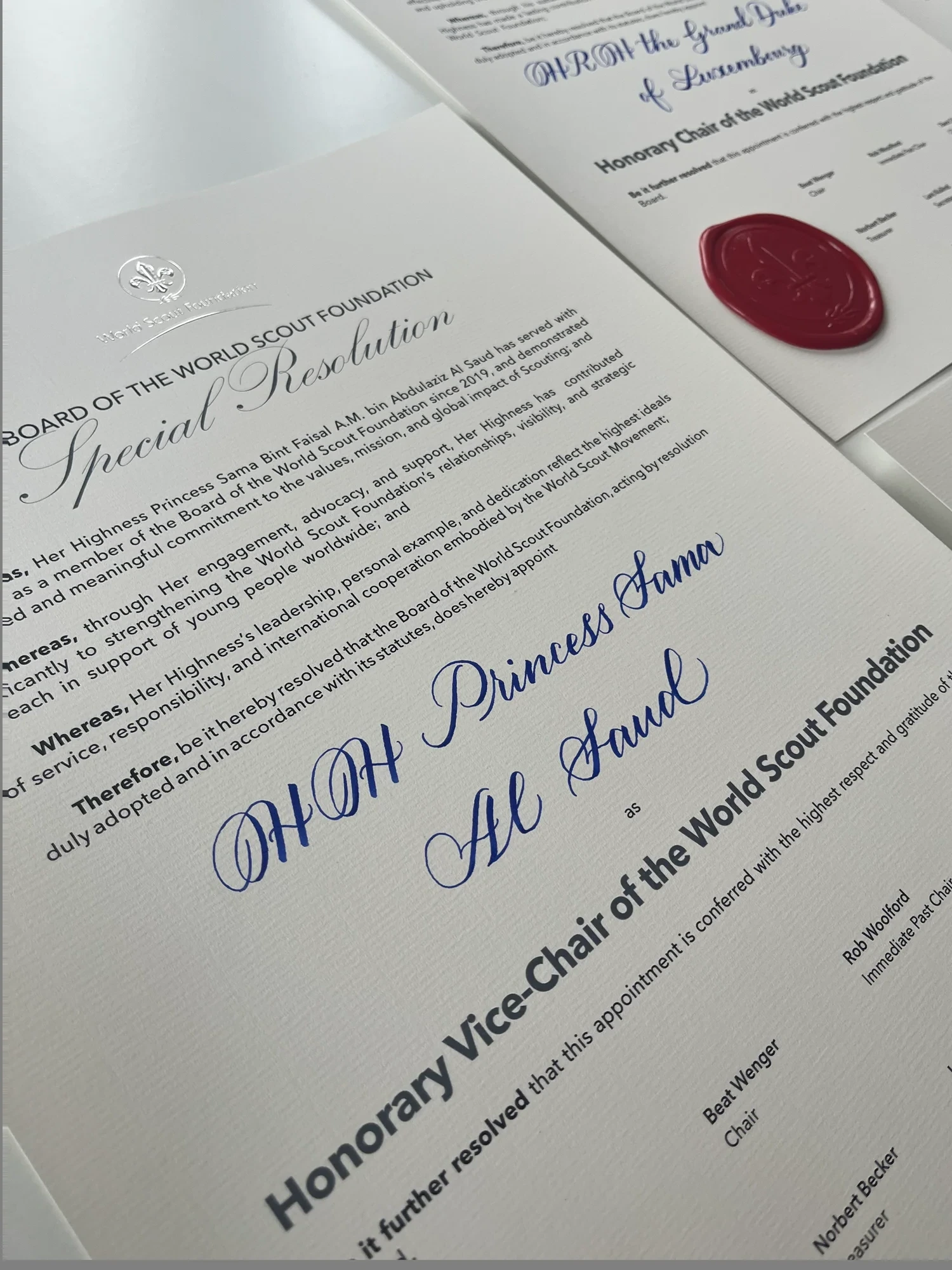 Detail of hand-lettered names on a formal certificate